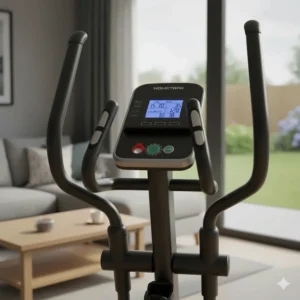 Close-up of the 8-level magnetic resistance dial and LCD monitor on a budget cross trainer.