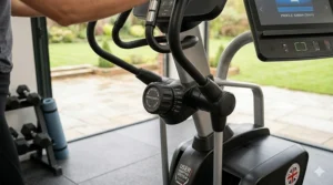 Close-up of the adjustable stride length dial on a family-friendly cross trainer for different user heights.