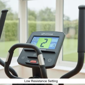 Close-up of a cross trainer console set to a low resistance level for gentle hip surgery recovery.