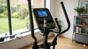 Close-up of the digital console showing workout metrics including time, watts, and distance in kilometres, designed for easy tracking during a home workout.