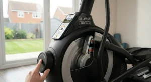A detailed view of the digital resistance controls on an app-connected elliptical, showing 24 levels of intensity.