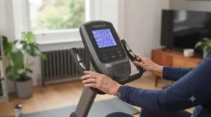 Digital console on a recumbent exercise bike displaying time and heart rate metrics.