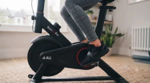 Close-up of secure, non-slip pedal straps on a home exercise bike, ensuring stability and safety while cycling.
