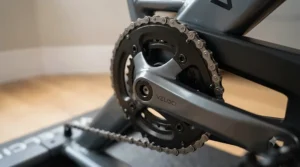 A step-by-step visual guide for performing routine maintenance on the drive train of an indoor cycling bike.