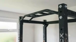 Multi-grip pull-up bar integrated into a sturdy power rack for a UK garage gym.